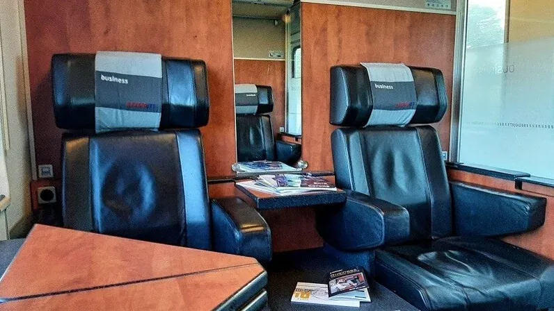 RegioJet Business class on the Vienna to Prague train — large black leather seats